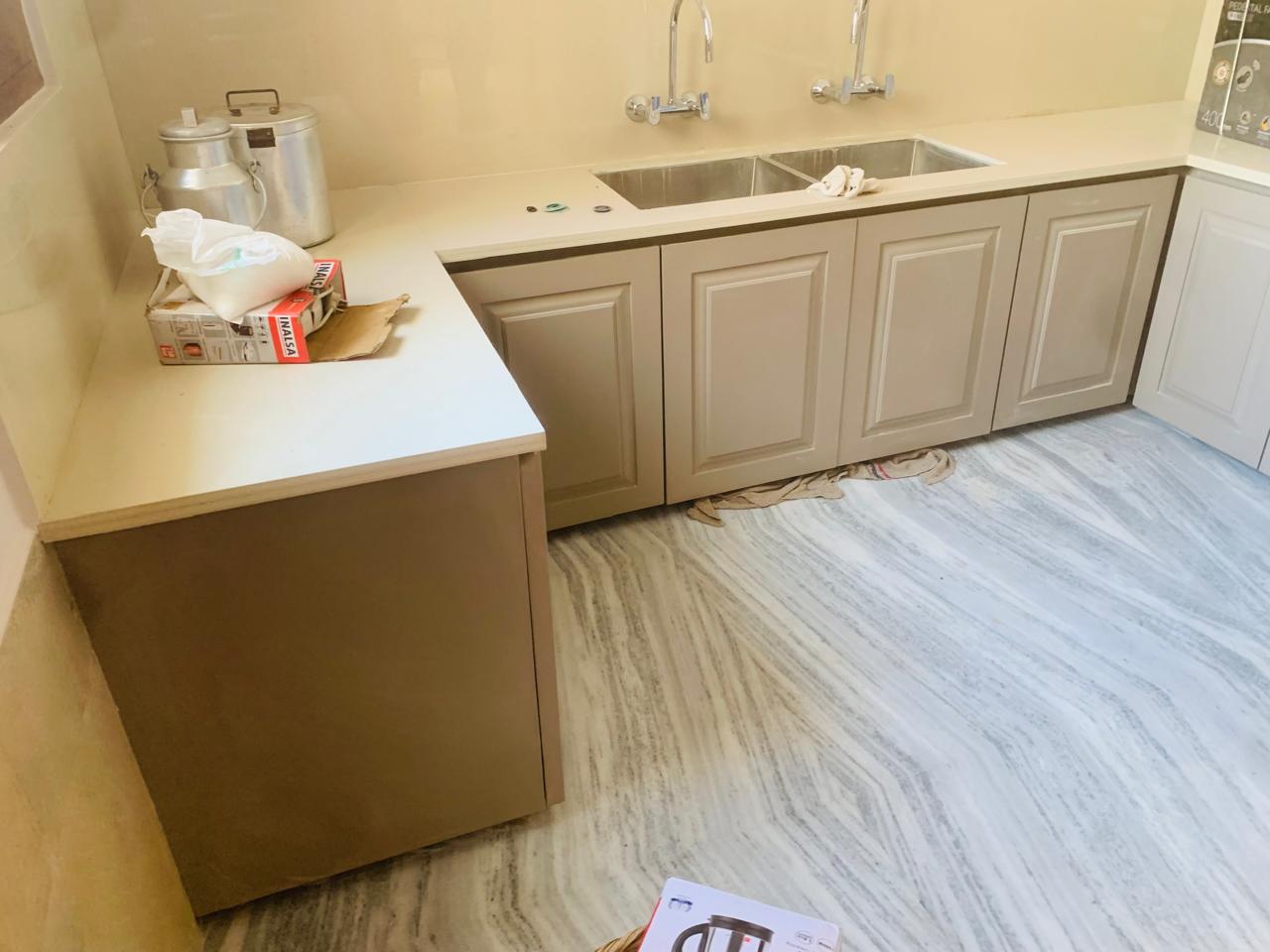 Modular kitchen cabinets with wooden finish